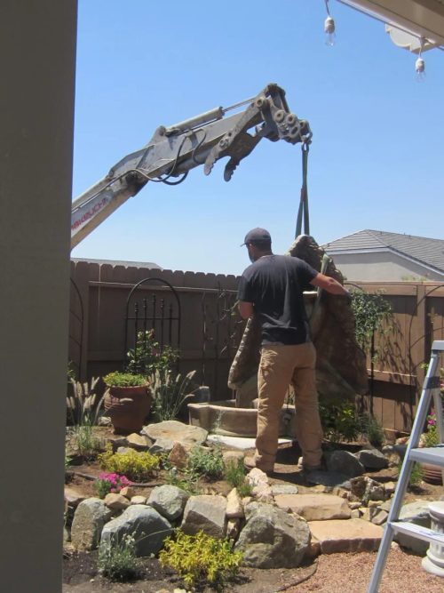 Helping it into position