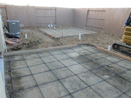 Two pads for patio and shed.